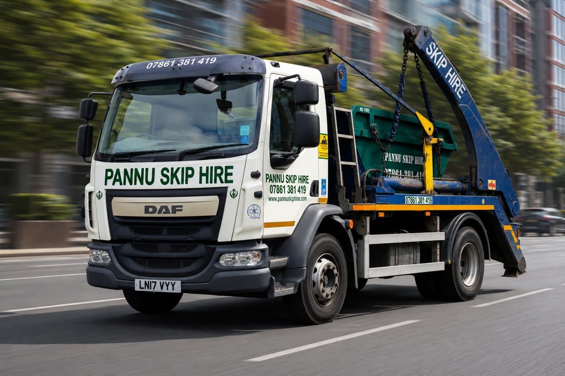 Stafford Skip Hire delivery lorry on the road, ready to deliver a skip across Stafford